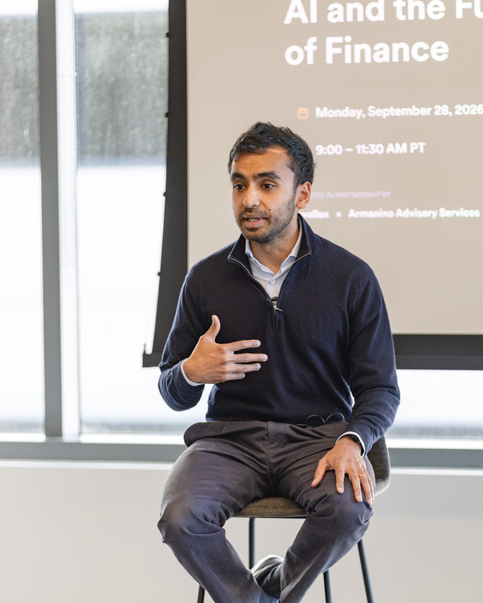 Close-up of Pranav Sood, CFO of Airwallex, speaking on stage at Airwallex's Beyond the Hype: AI and the Future of Finance breakfast fireside chat at the Airwallex San Francisco office by JY Studio
