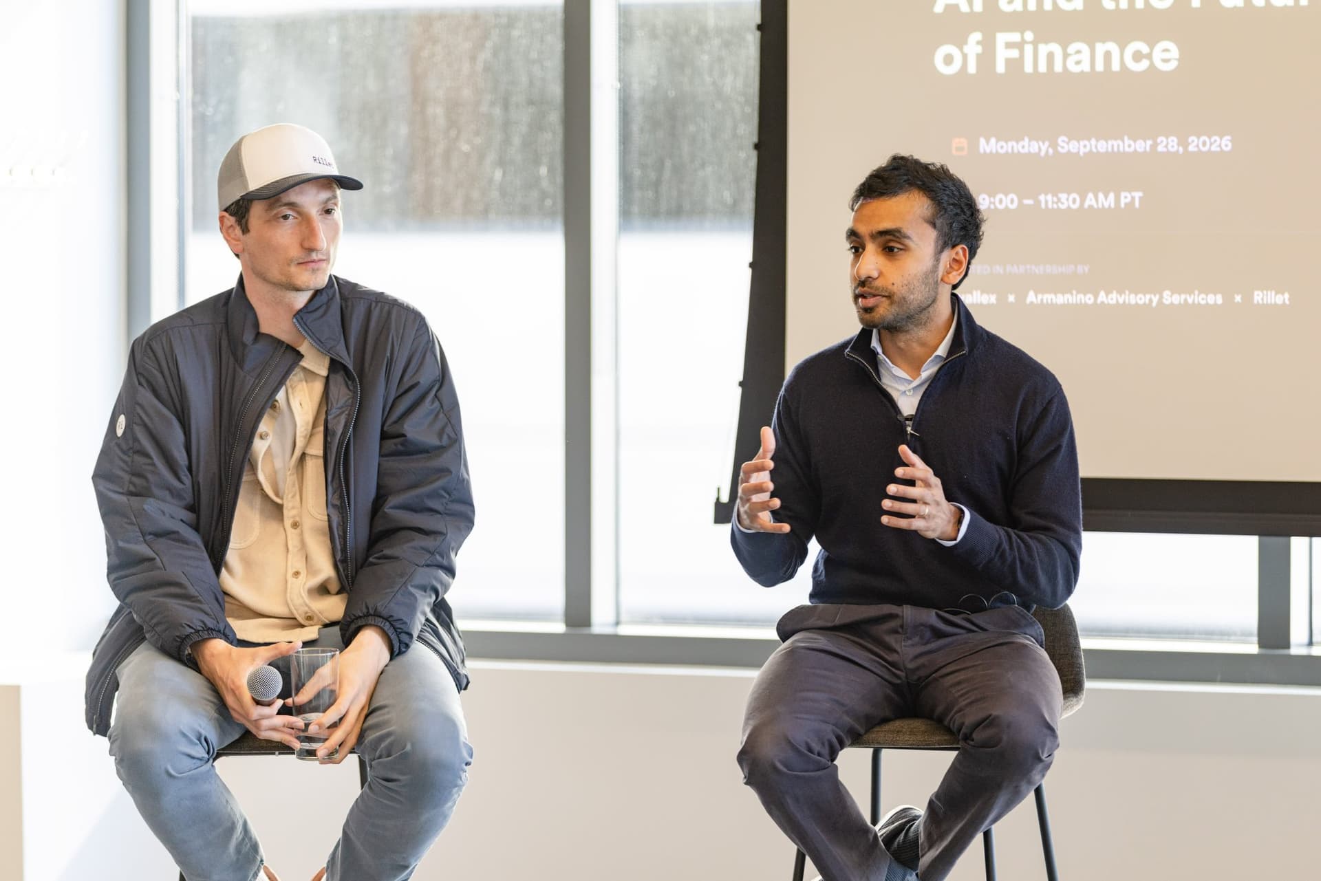 Nicolas Kopp of Rillet listening as Pranav Sood of Airwallex speaks at Airwallex's Beyond the Hype: AI and the Future of Finance breakfast fireside chat at the Airwallex San Francisco office by JY Studio