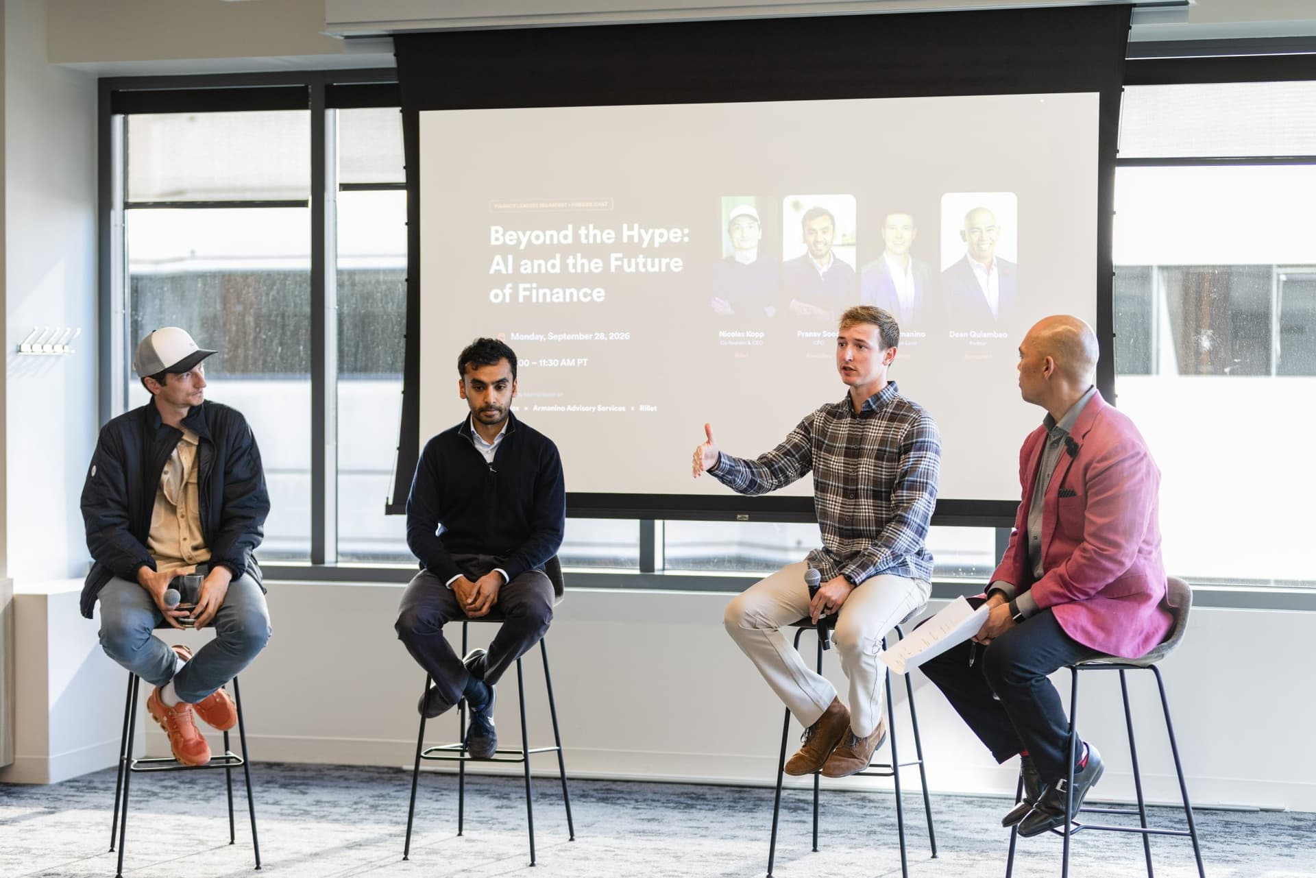 Drew Armanino gesturing as the panel discusses AI and digital transformation in finance at Airwallex's Beyond the Hype: AI and the Future of Finance breakfast fireside chat at the Airwallex San Francisco office by JY Studio