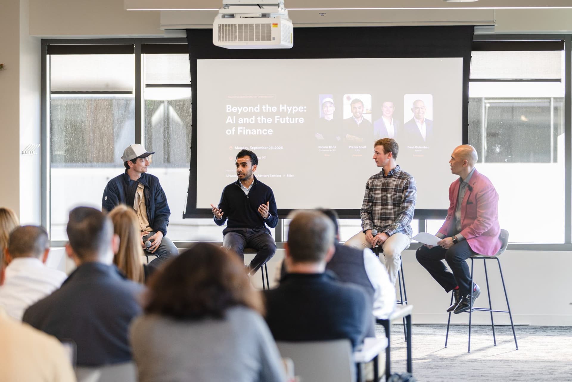 Pranav Sood of Airwallex speaking to a packed room of CFOs and controllers at Airwallex's Beyond the Hype: AI and the Future of Finance breakfast fireside chat at the Airwallex San Francisco office by JY Studio
