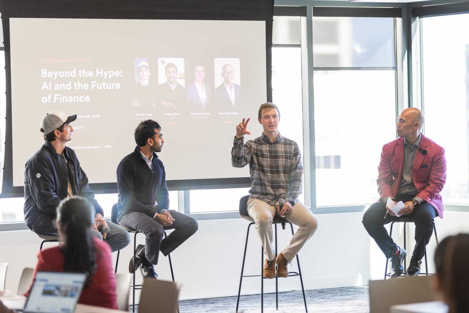 Drew Armanino gesturing to the audience during the panel at Airwallex's Beyond the Hype: AI and the Future of Finance breakfast fireside chat at the Airwallex San Francisco office by JY Studio