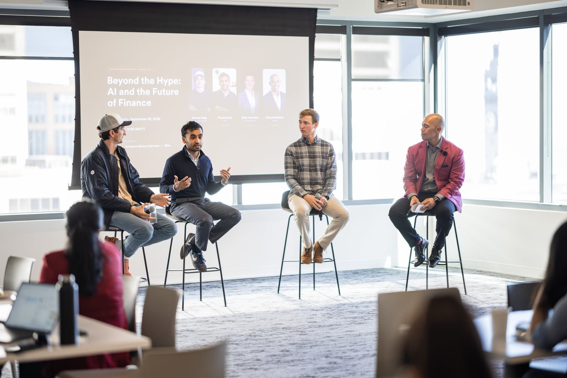 Side view of the fireside chat with the audience at their tables at Airwallex's Beyond the Hype: AI and the Future of Finance breakfast fireside chat at the Airwallex San Francisco office by JY Studio