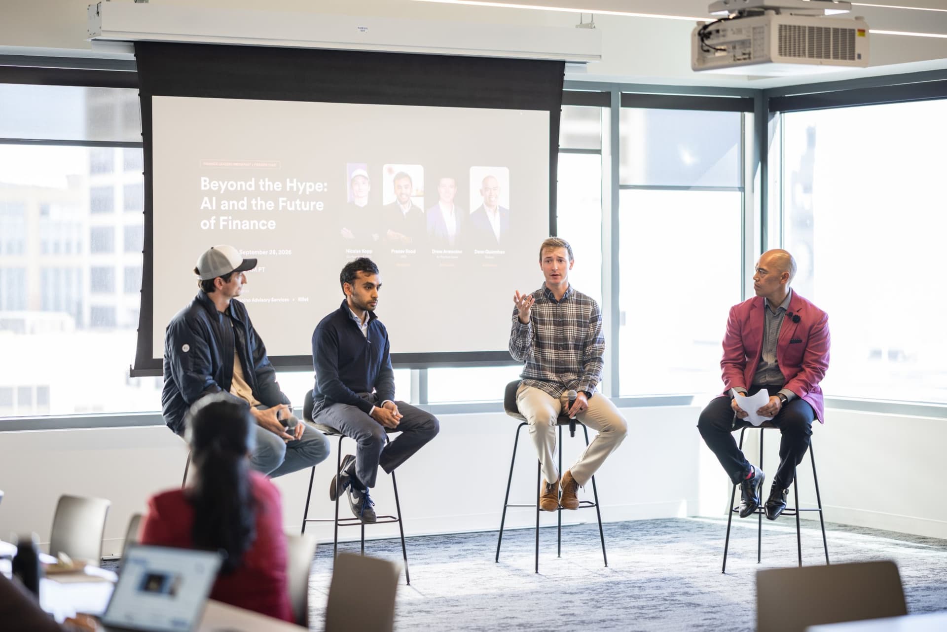 Drew Armanino speaking as the panel looks on at Airwallex's Beyond the Hype: AI and the Future of Finance breakfast fireside chat at the Airwallex San Francisco office by JY Studio