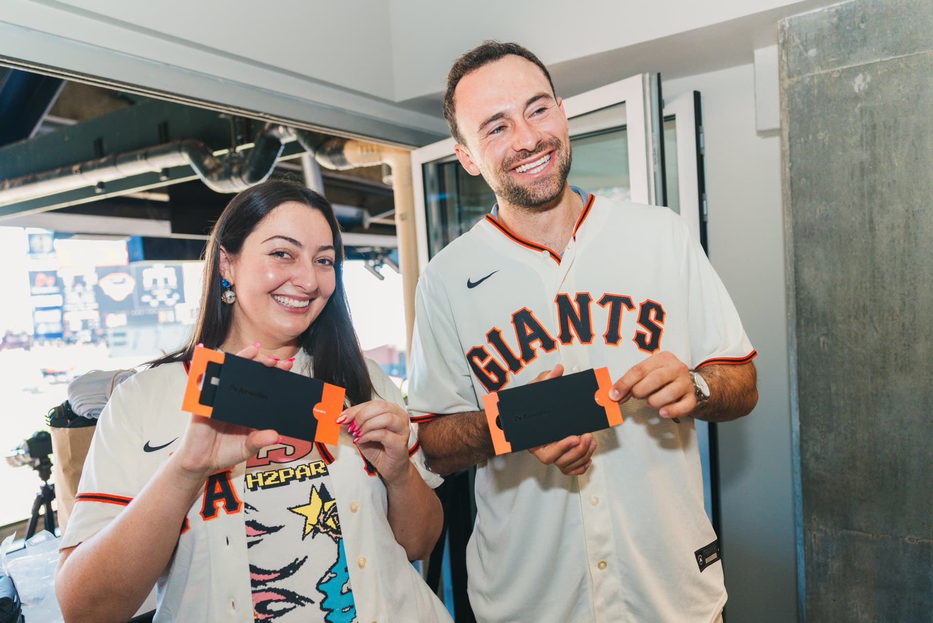 Founders and creators networking inside the Airwallex suite at Oracle Park in San Francisco by JY Studio