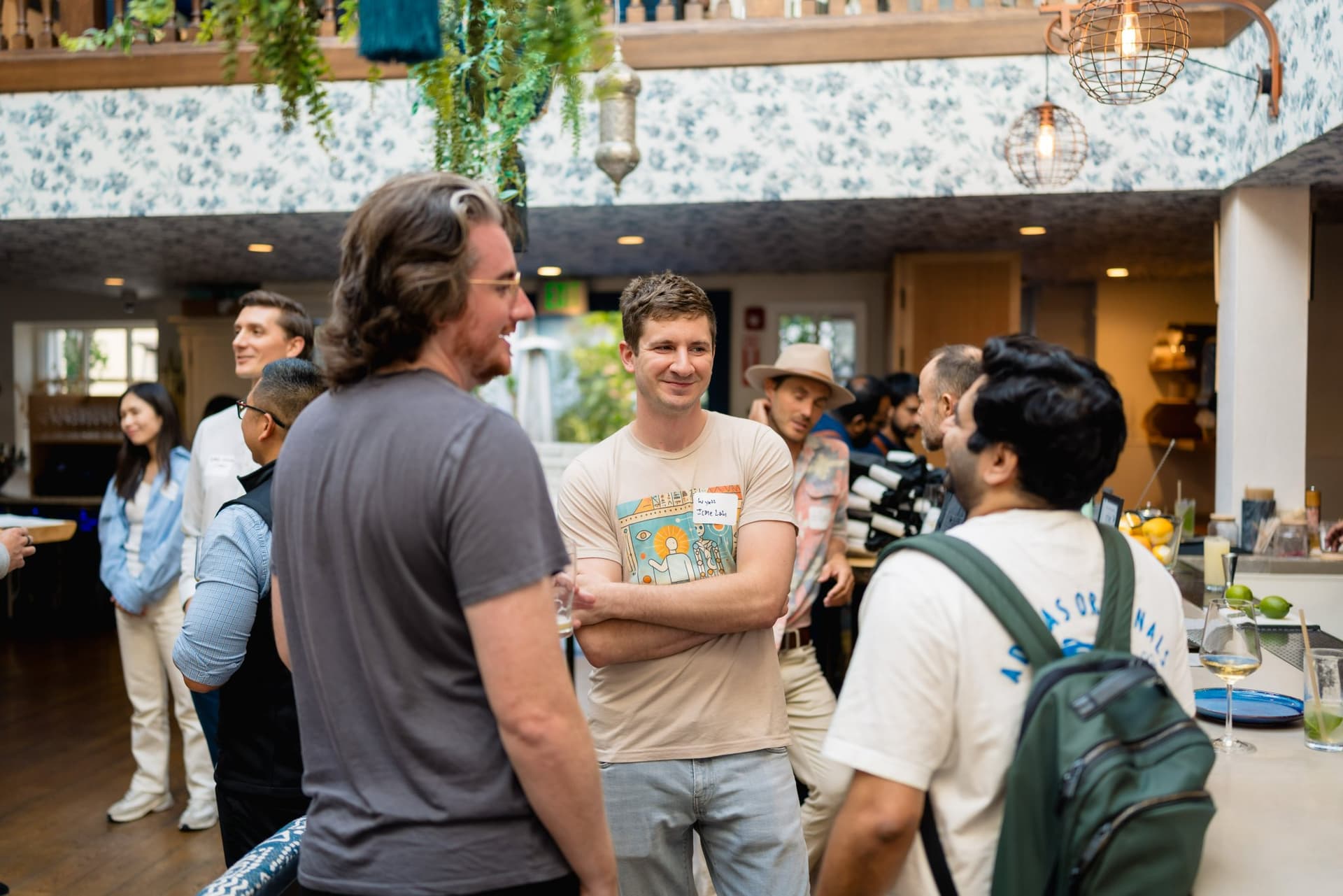 Builders and researchers introducing themselves at the Apollo AI Accelerator reception in Los Altos, Bay Area by JY Studio