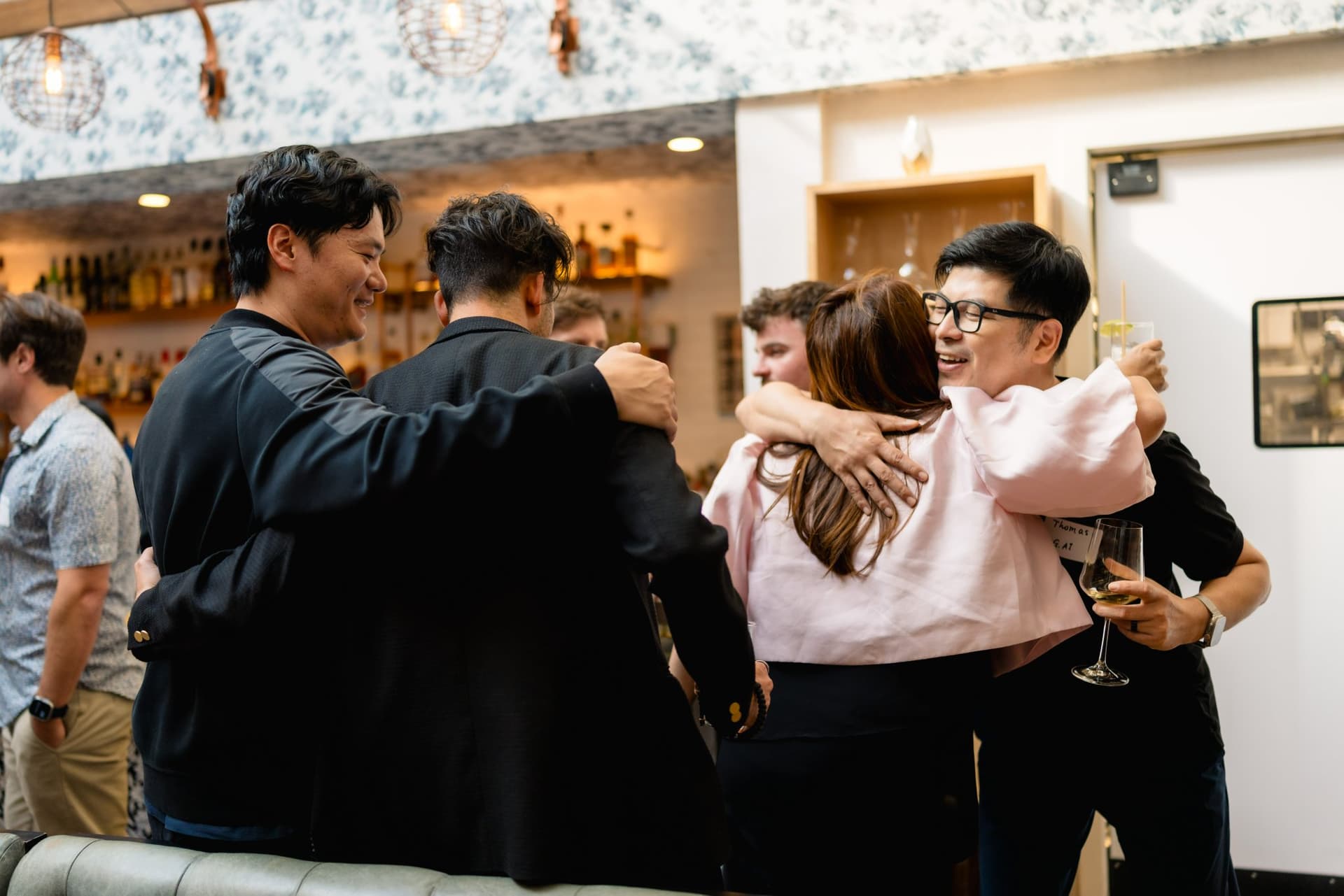 Tech professionals gathered for a group discussion at the Apollo AI Accelerator networking event in Los Altos, Bay Area by JY Studio