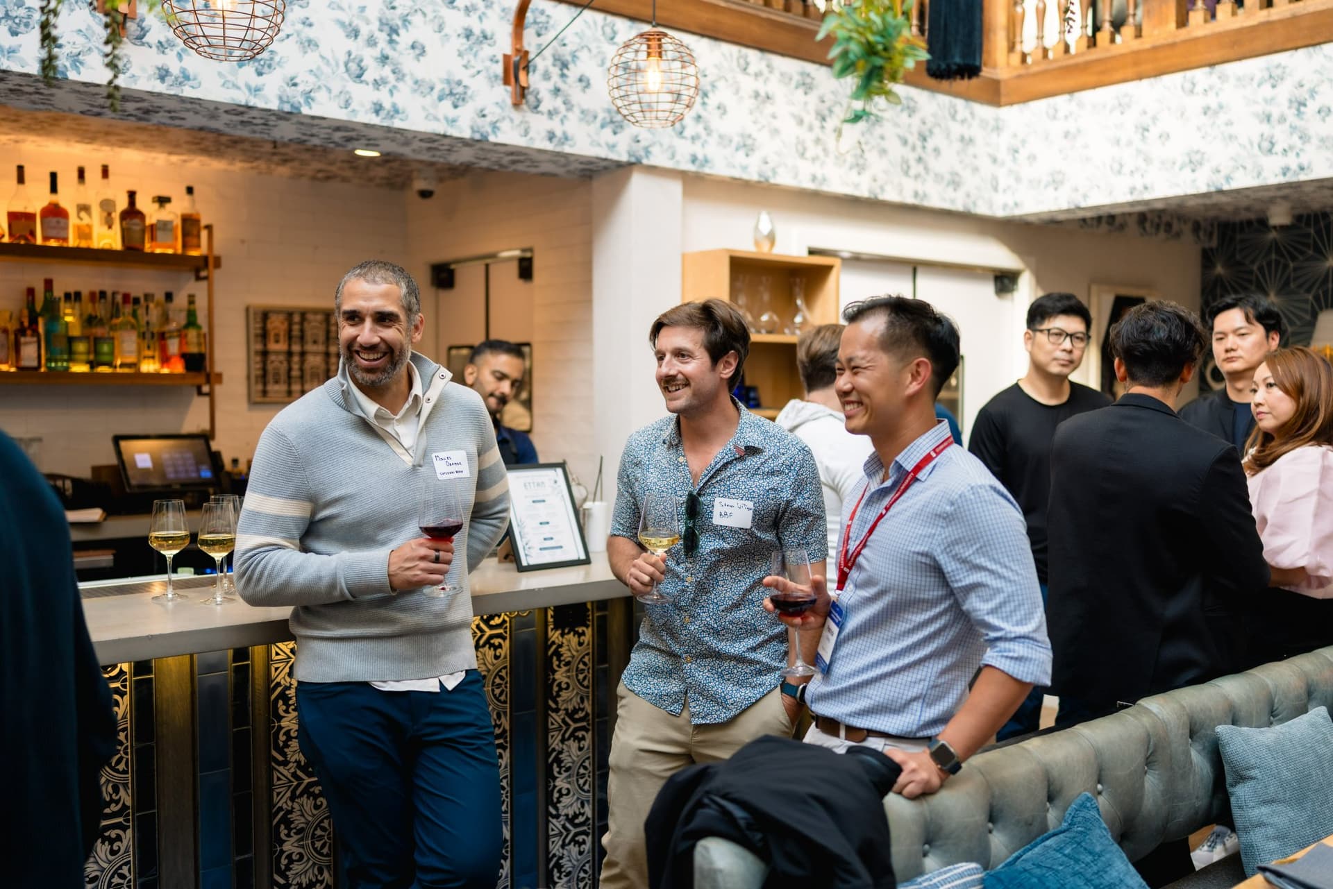 Startup founders arriving and checking in at the Apollo AI Accelerator networking event in Los Altos, Bay Area by JY Studio