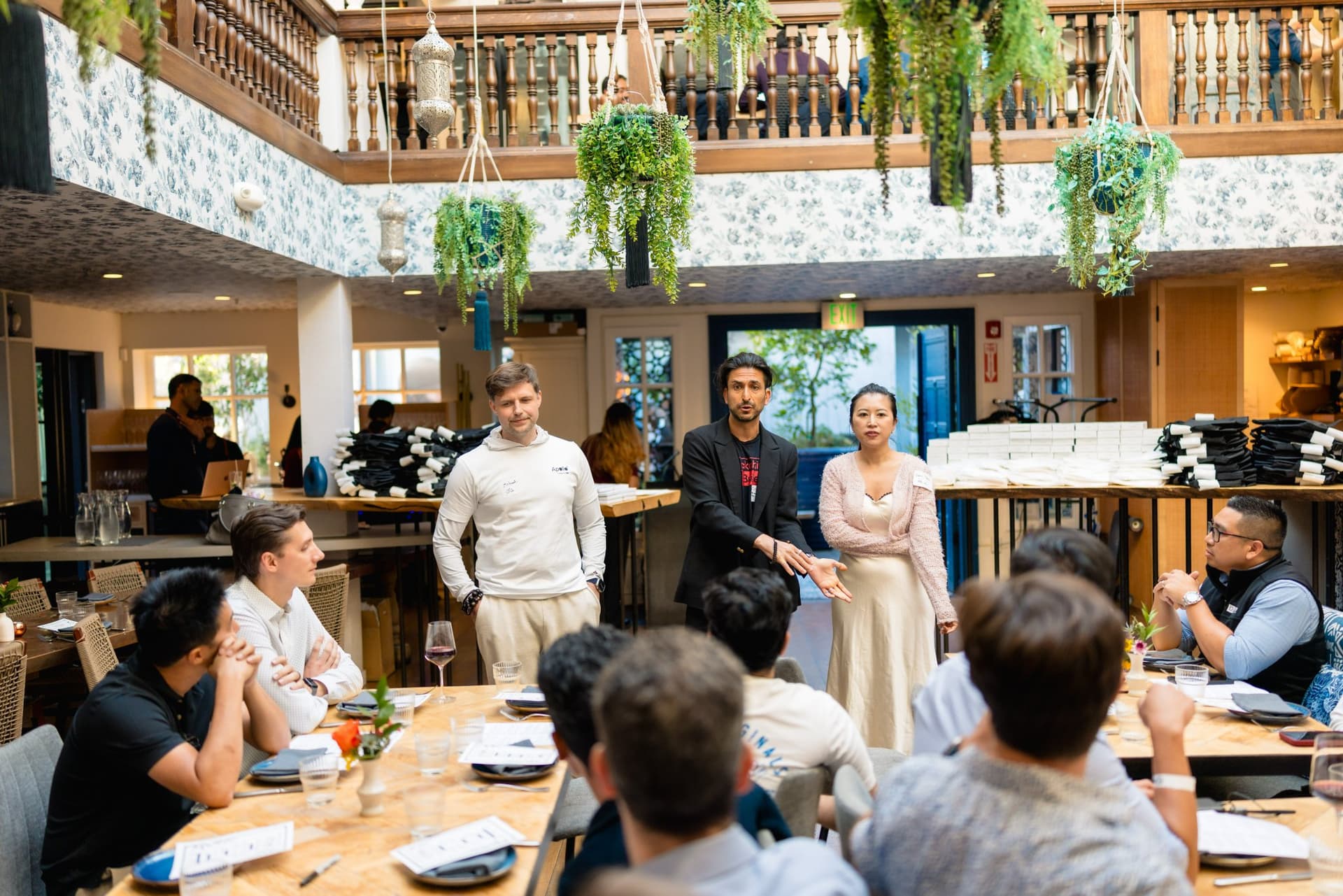 Builders and researchers in candid conversation at the Apollo AI Accelerator mixer in Los Altos, Silicon Valley by JY Studio