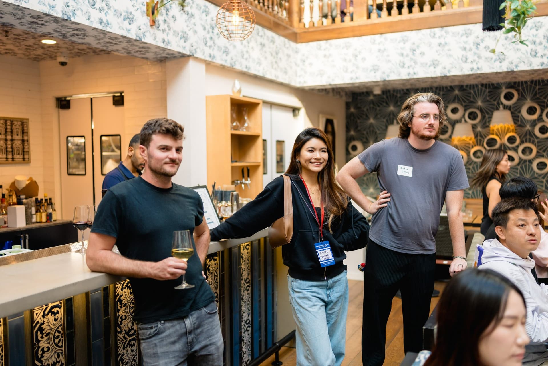 Founders and builders mingling during the Apollo AI Accelerator reception in Los Altos by JY Studio