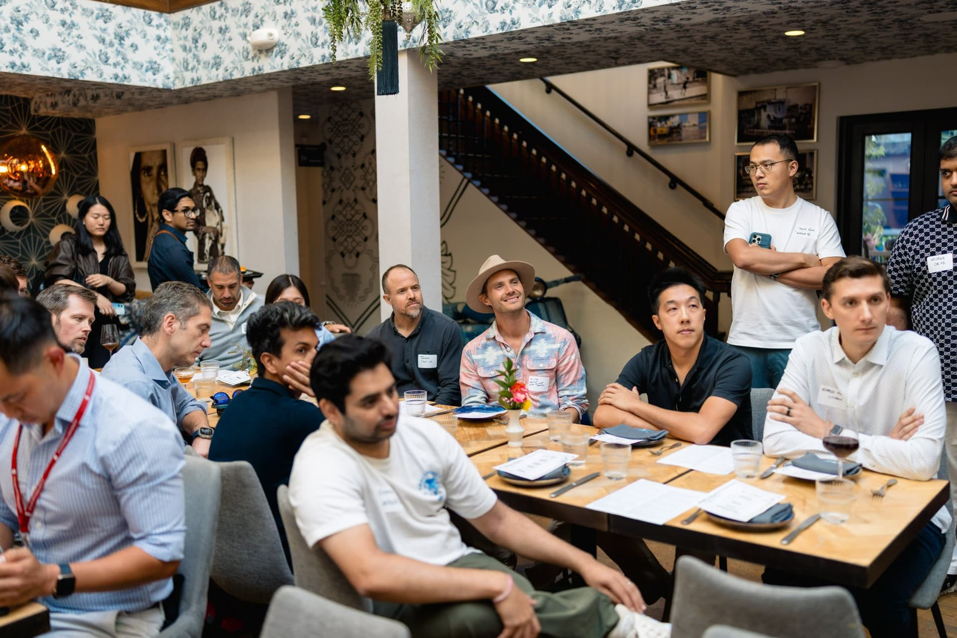 Engineers and researchers exchanging ideas at the Apollo AI Accelerator mixer in Los Altos, Silicon Valley by JY Studio