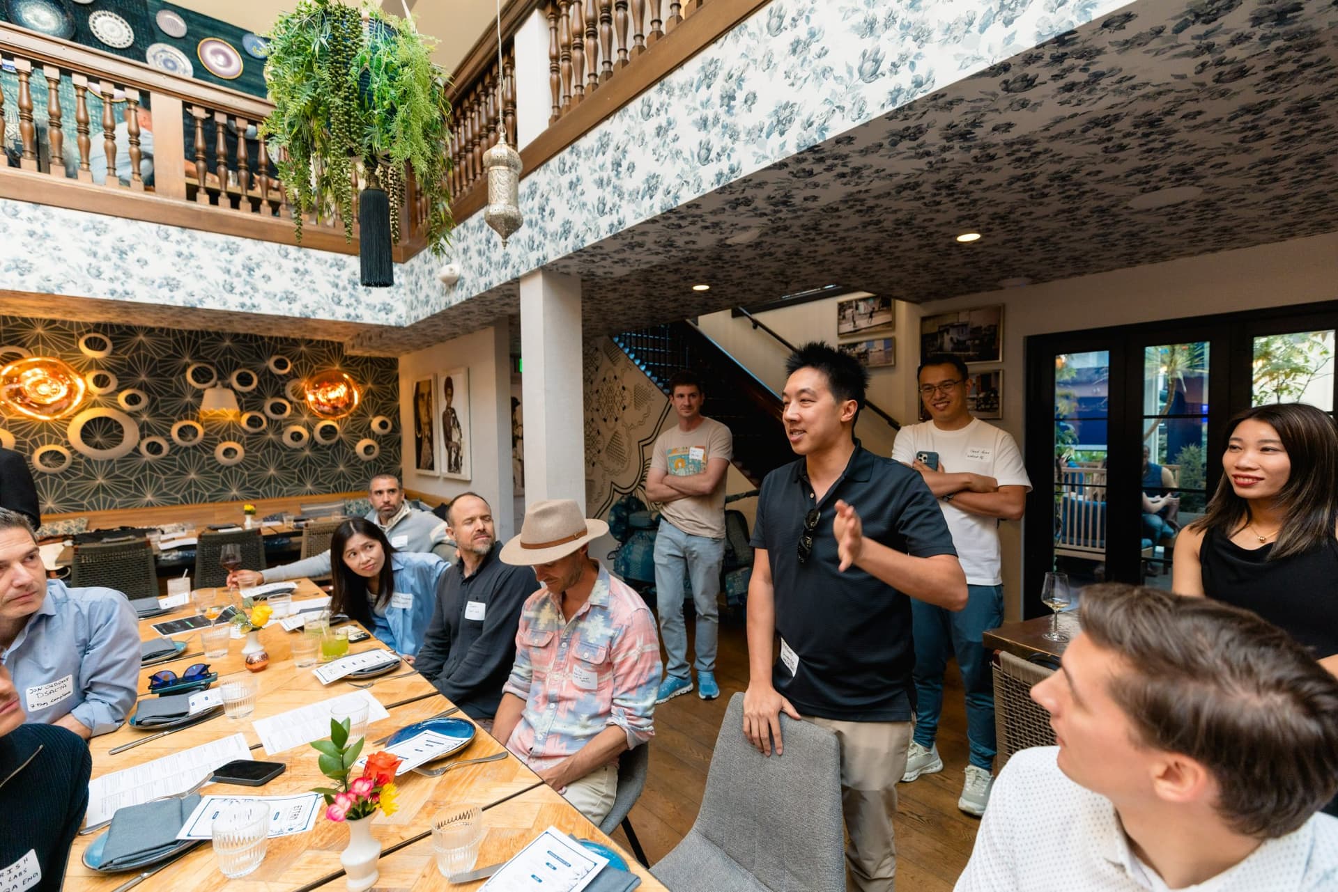 Accelerator cohort members in candid conversation at the Apollo AI Accelerator reception in Los Altos, Silicon Valley by JY Studio