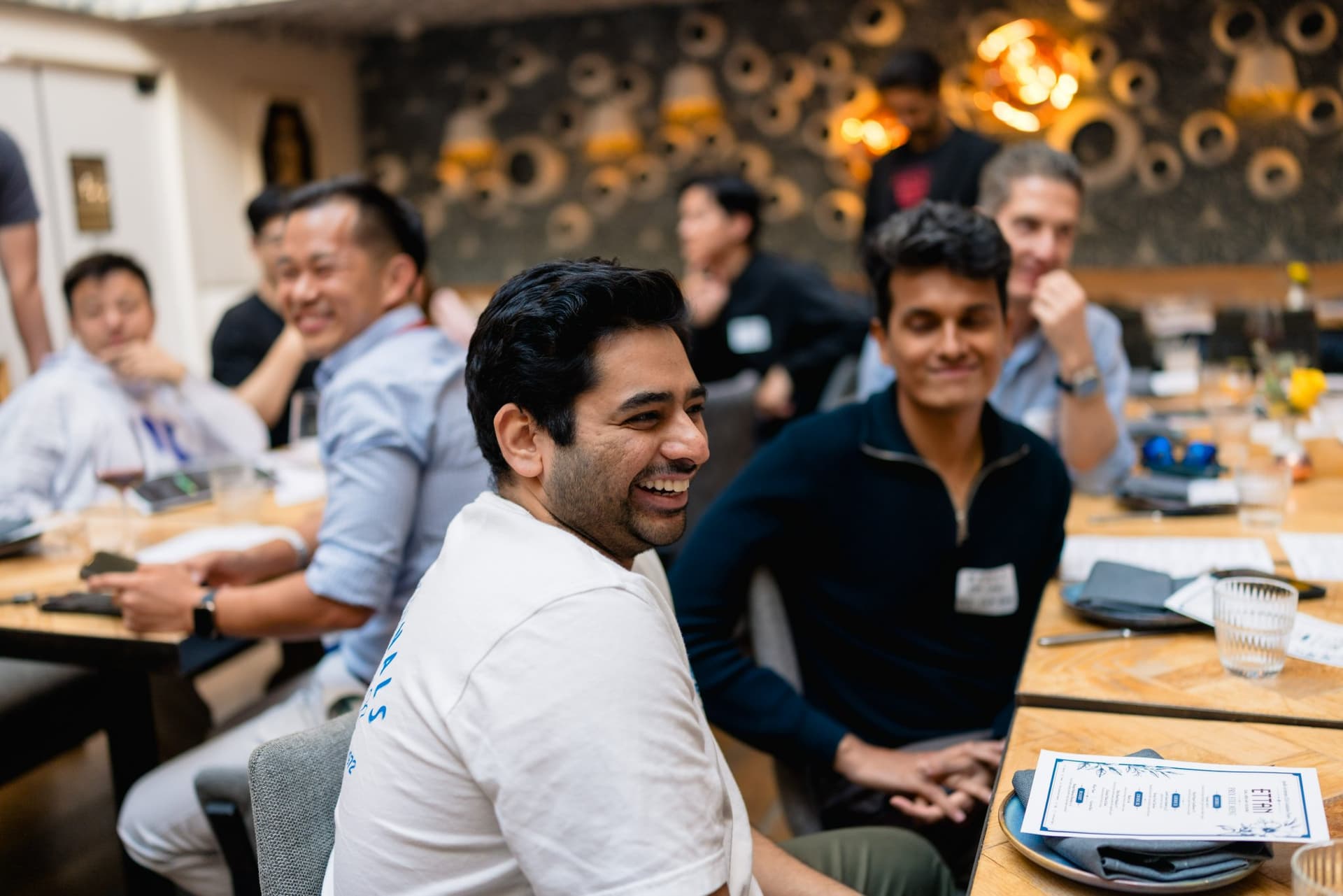 Builders and researchers networking during Apollo, the AI Accelerator powered by 0G and Stanford Builders, in Los Altos, Bay Area by JY Studio