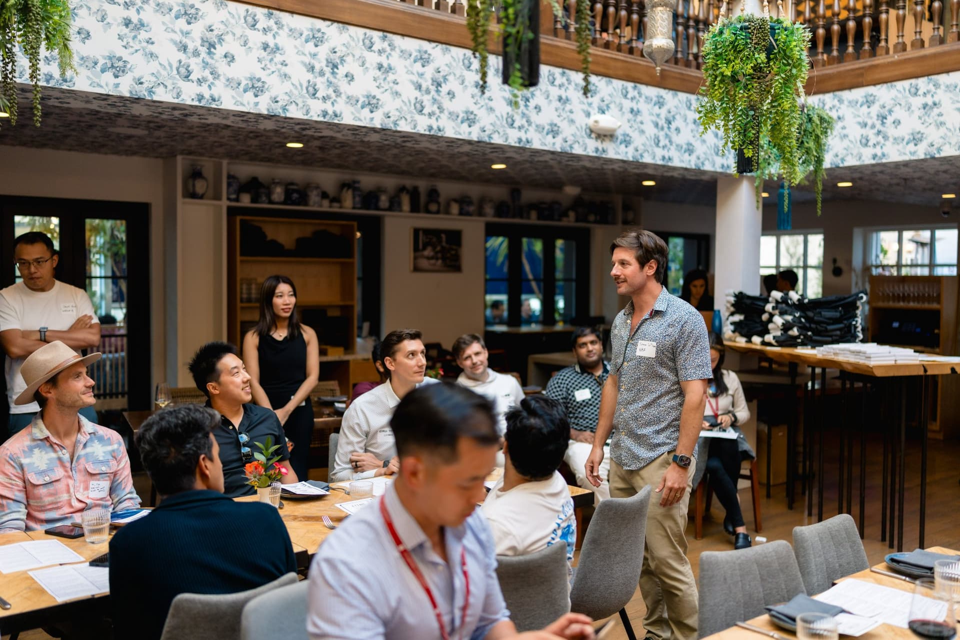 Founders and builders sharing a laugh at the Apollo AI Accelerator reception in Los Altos, Bay Area by JY Studio