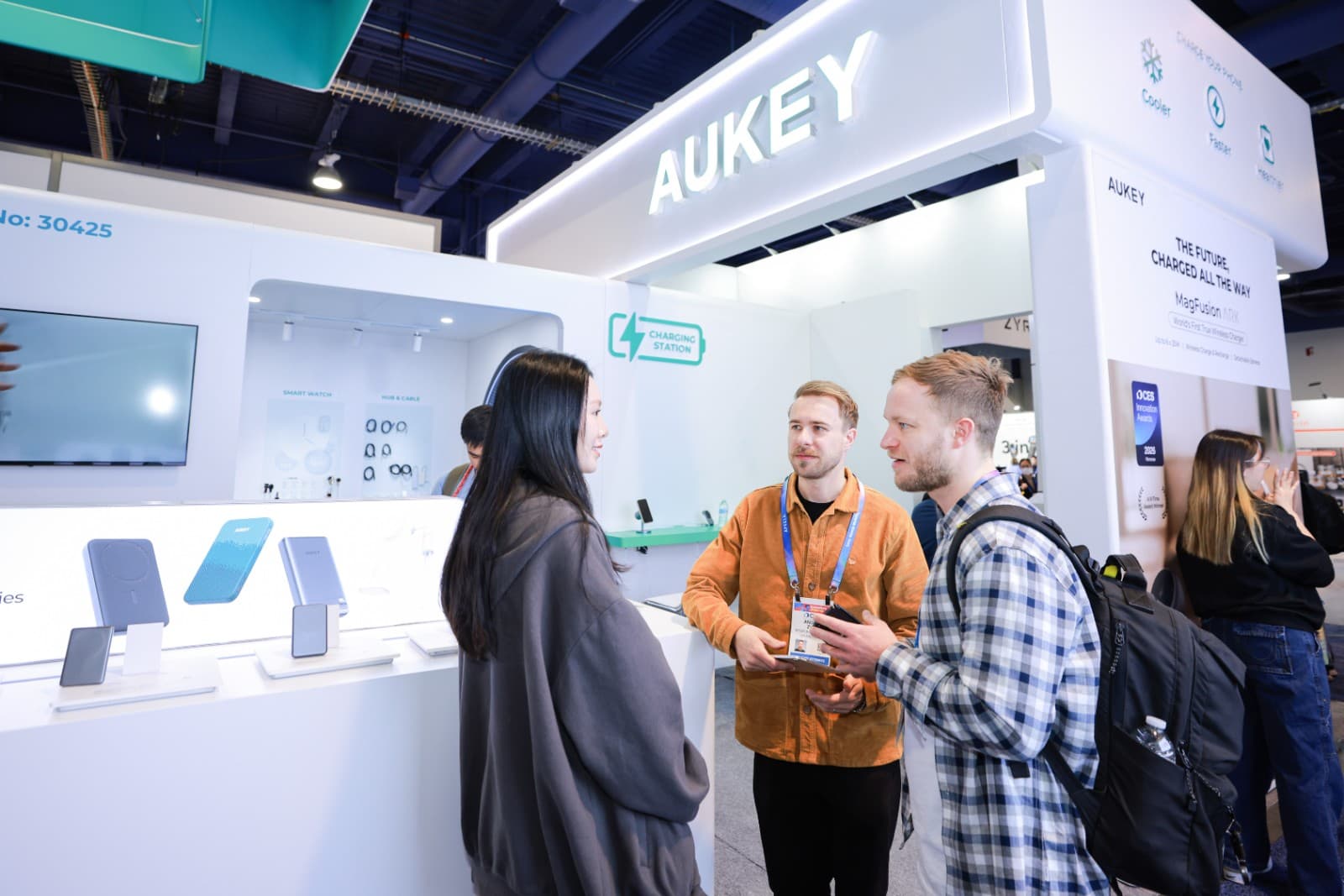 AUKEY product exhibition and team photography at CES 2026 Las Vegas consumer electronics trade show by JY Studio
