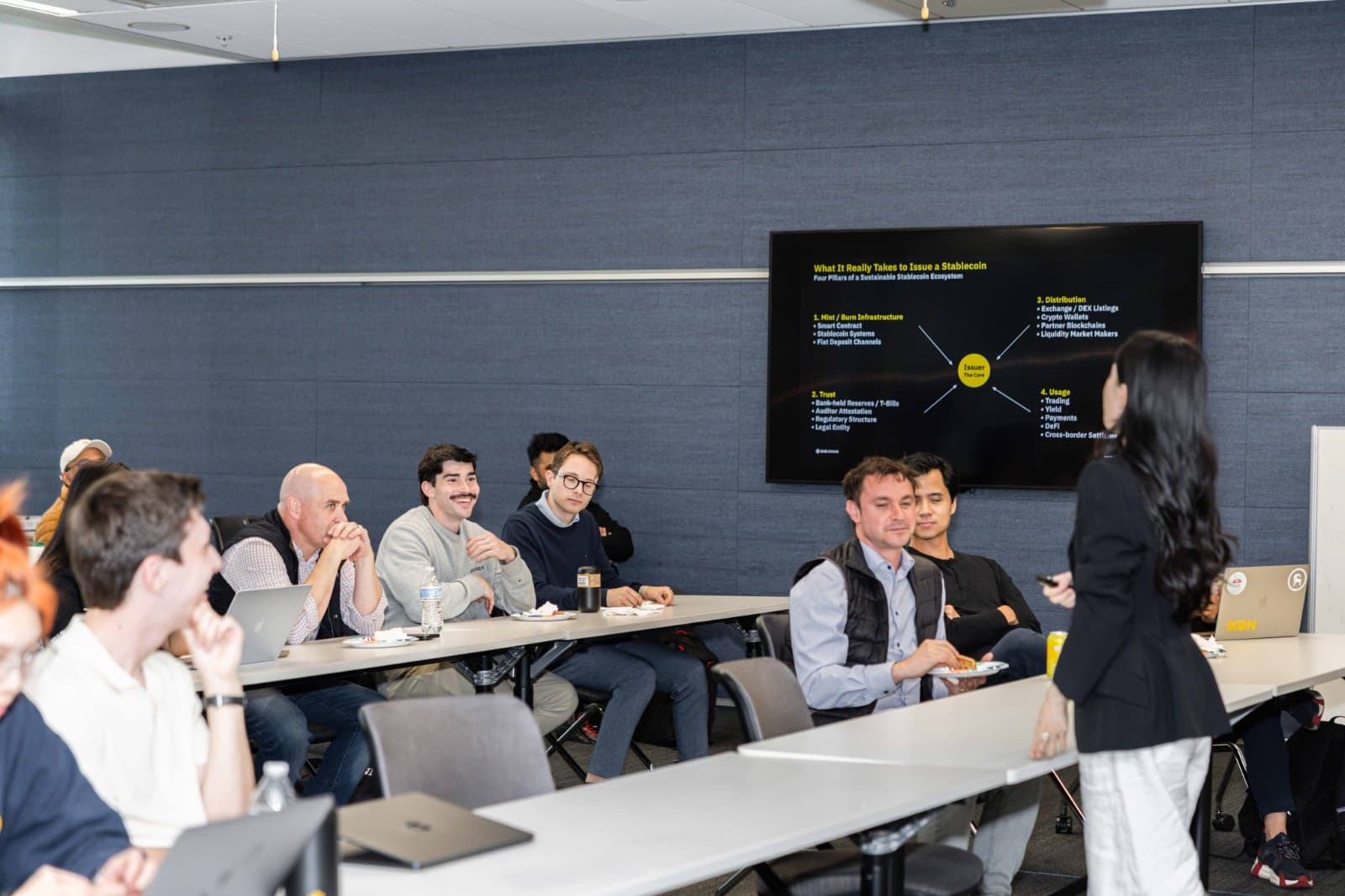 Crypto developers networking with BNB Chain team at UC Berkeley university event by JY Studio