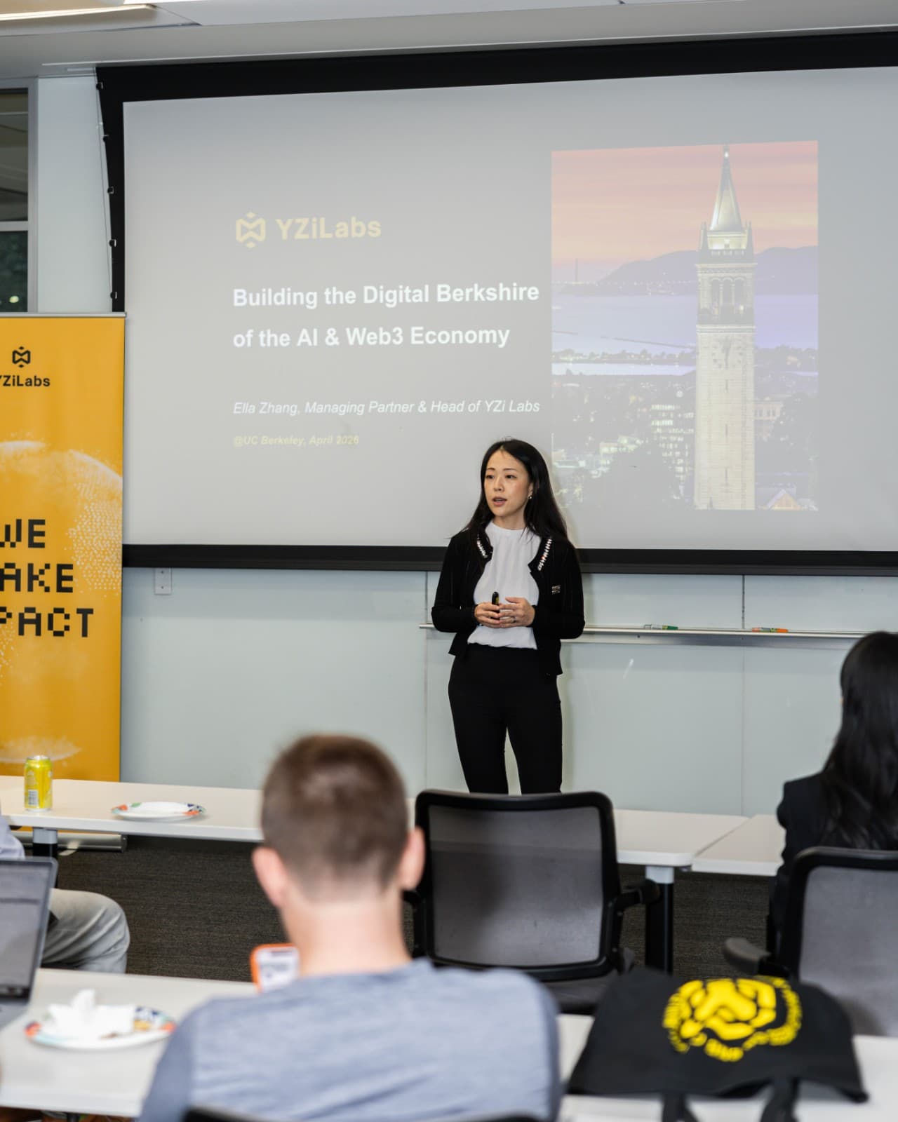 Speaker presenting Web3 use cases on stage at BNB Chain event at UC Berkeley by JY Studio
