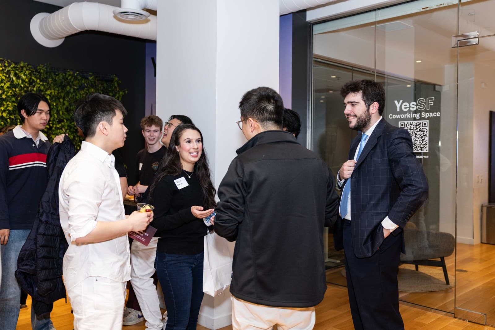 Industry leaders exchanging ideas at CAN Networking Event in San Francisco Bay Area by JY Studio