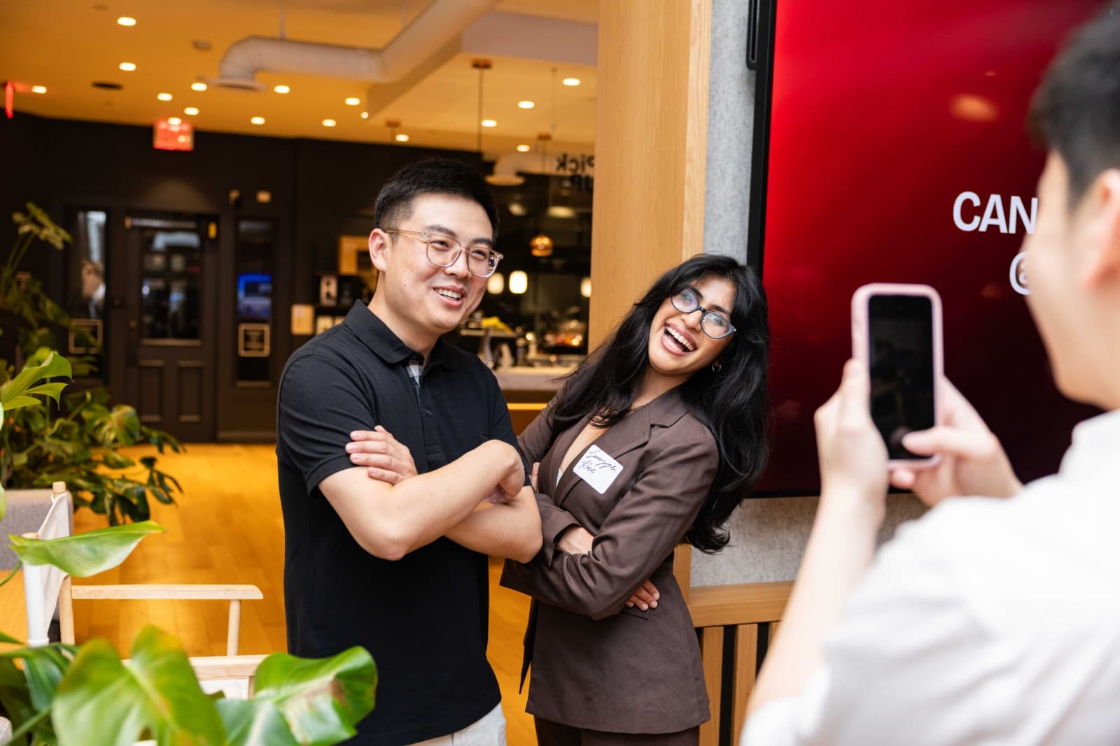 Engaging conversations between attendees at CAN Networking Event at Yes SF by JY Studio