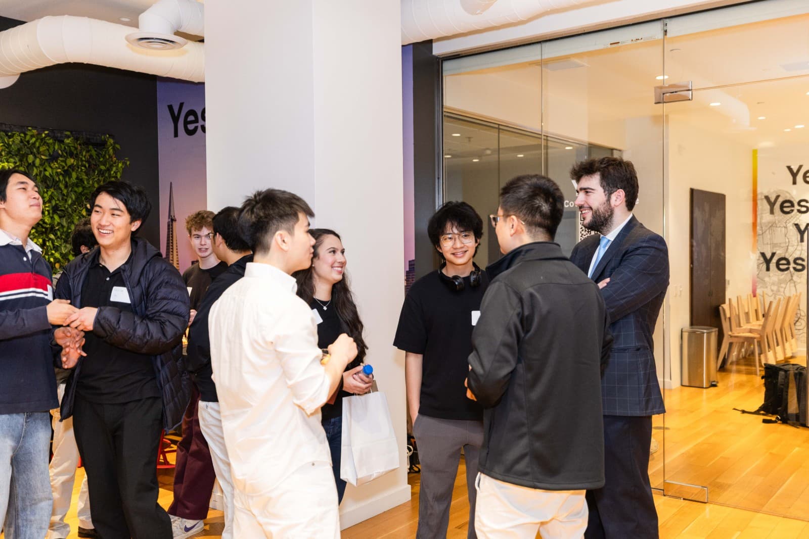 Festive networking atmosphere at Crimson Alumni Network event in San Francisco Bay Area by JY Studio