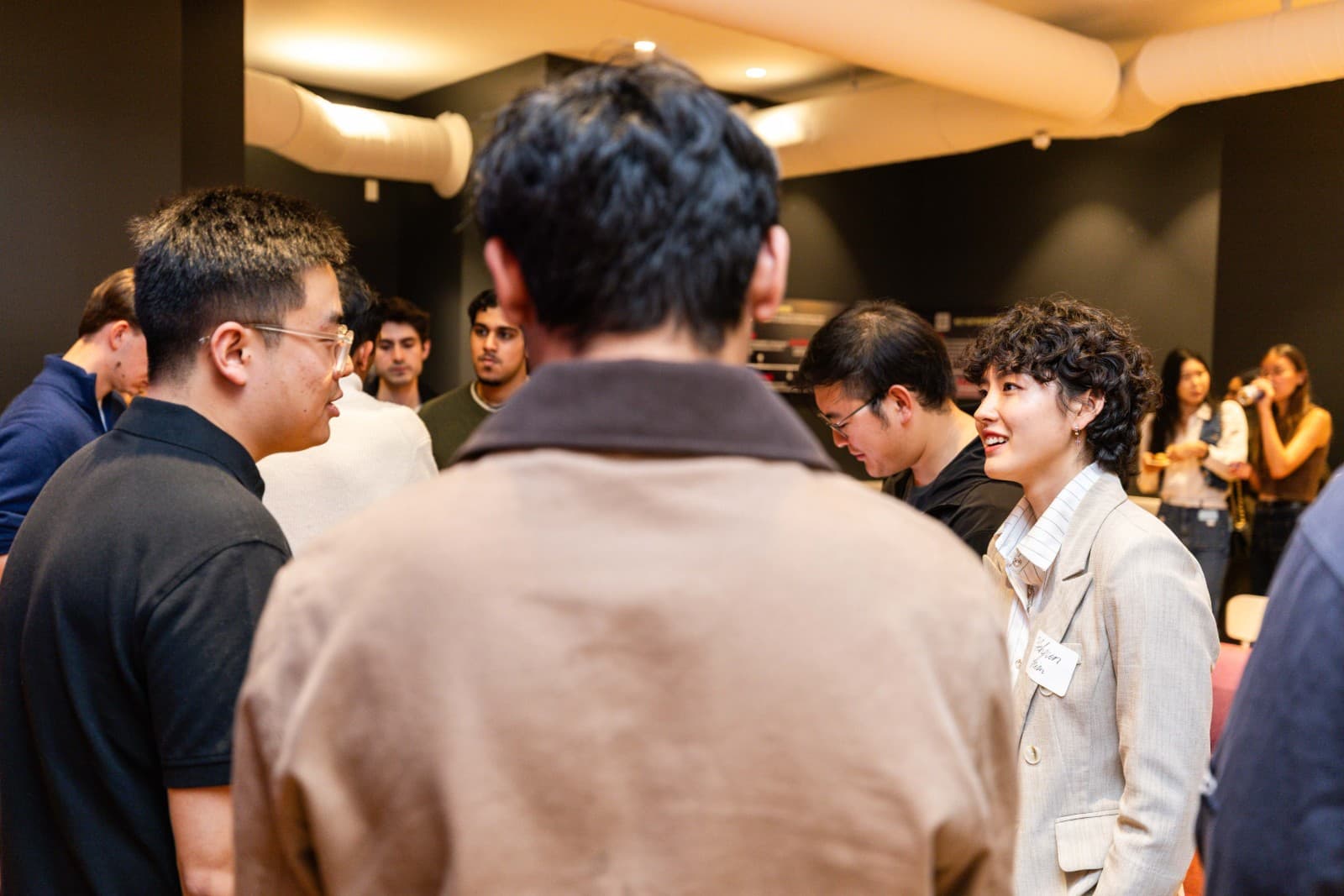 Community spirit and camaraderie at Crimson Alumni Network event in San Francisco by JY Studio
