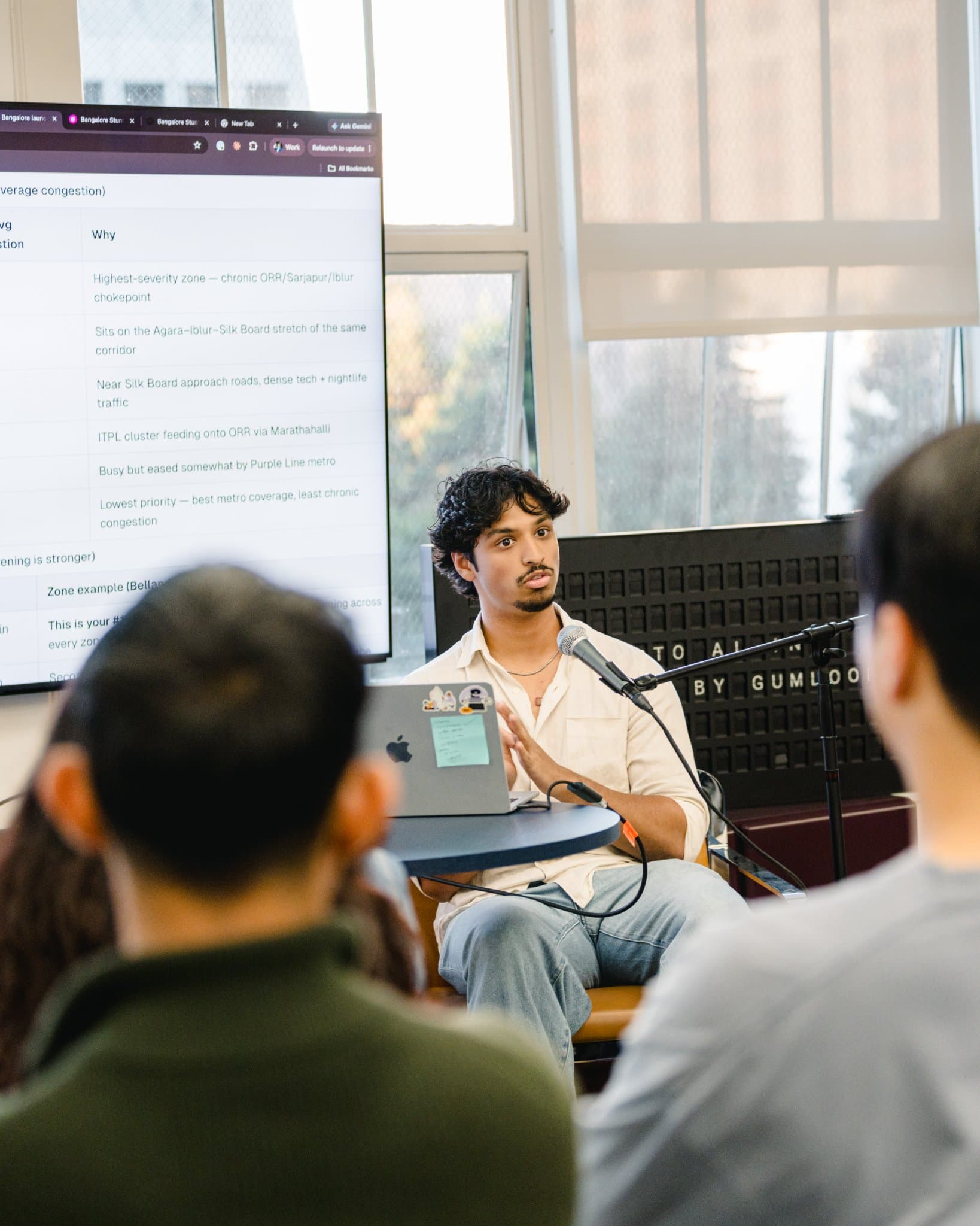 Speaker sharing insights on AI agents for go-to-market teams at Gumloop's San Francisco meetup