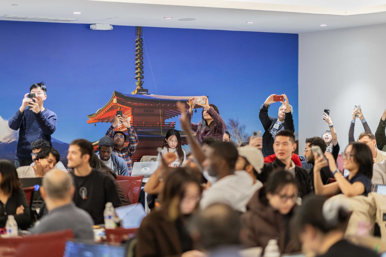 Coding teams working together at Hackathon @NYC competition by JY Studio