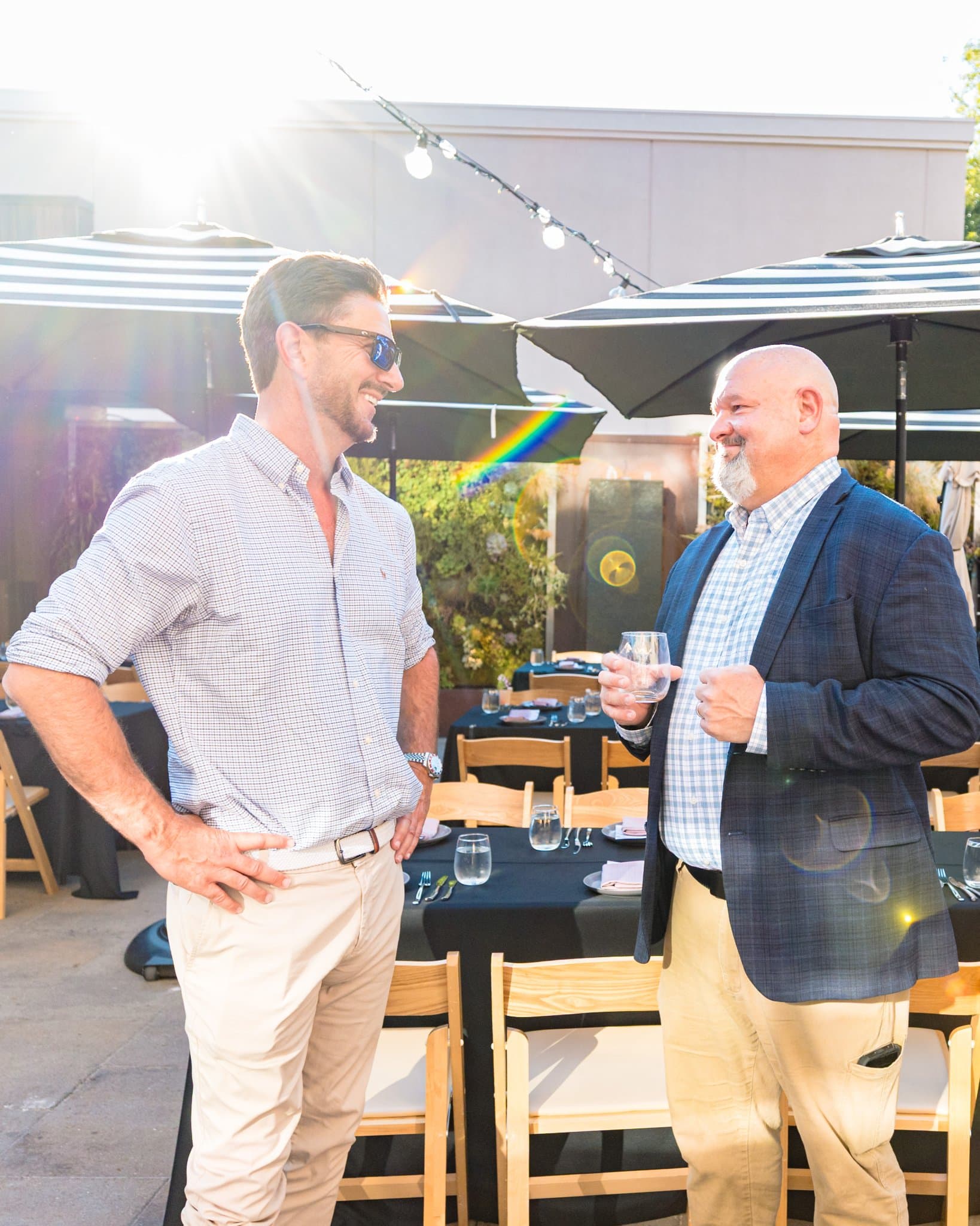 Members mingling on the patio at the start of the Magnus networking event in Palo Alto