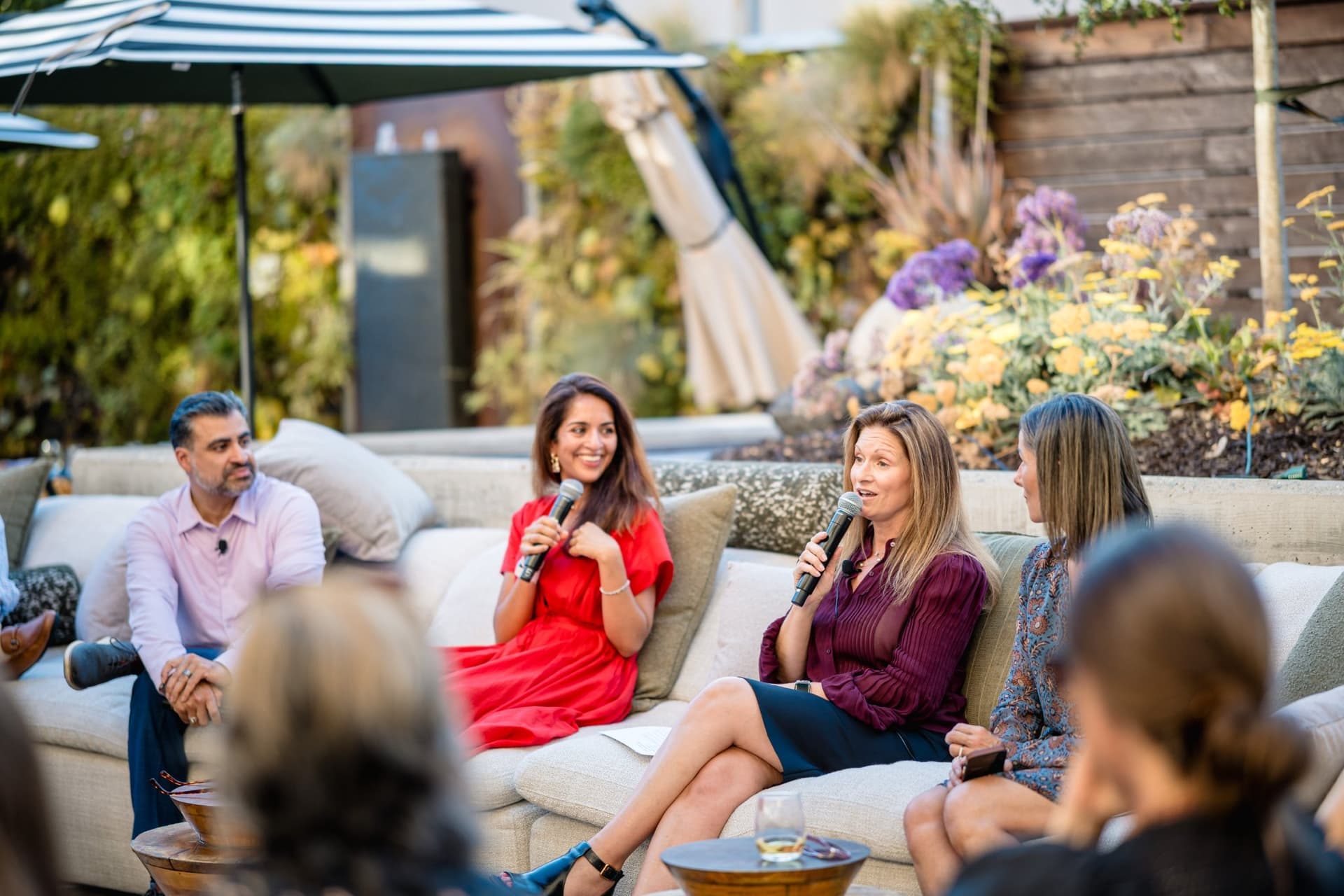 Members raising their glasses during a heartfelt toast at the Magnus event in Palo Alto