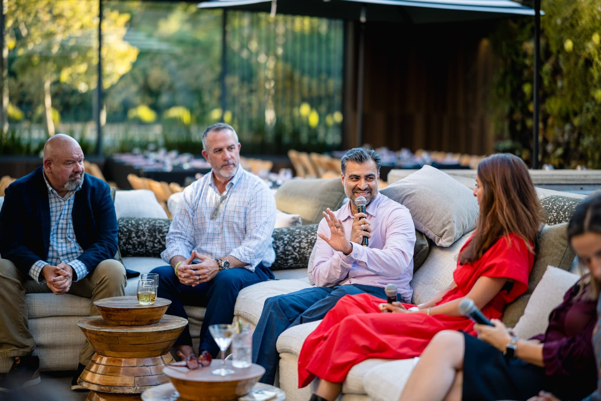 Panelist sharing insights during the Magnus fireside chat on the Palo Alto patio