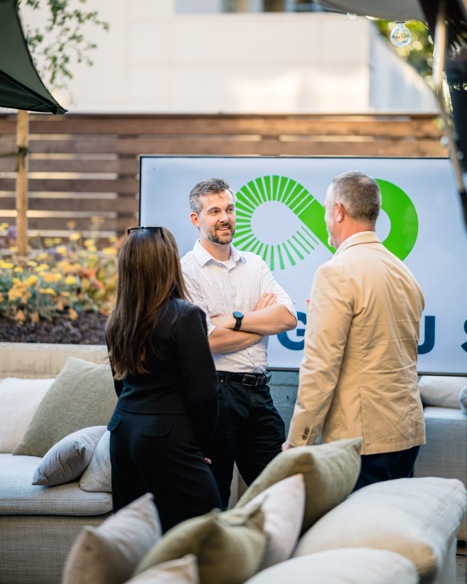 Attendees seated near the fire pit tables during the Magnus panel discussion in Palo Alto