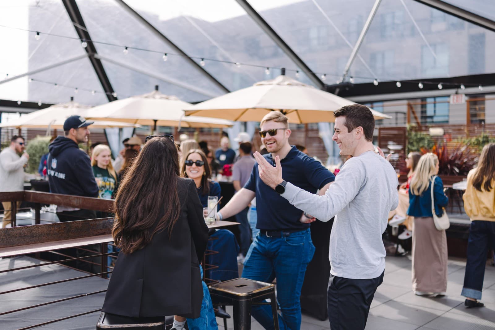 NFL marketing team networking at Super Bowl LX lunch at The Pearl SF Rooftop in San Francisco by JY Studio
