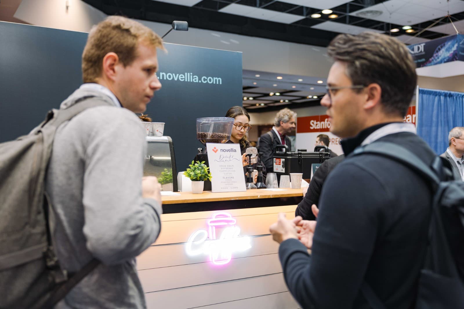 Novellia team portrait at PMWC 2026 Precision Medicine World Conference in Santa Clara by JY Studio