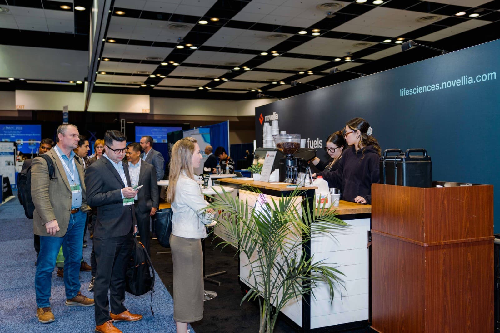 Live product demonstration at Novellia PMWC 2026 booth in Santa Clara Silicon Valley by JY Studio