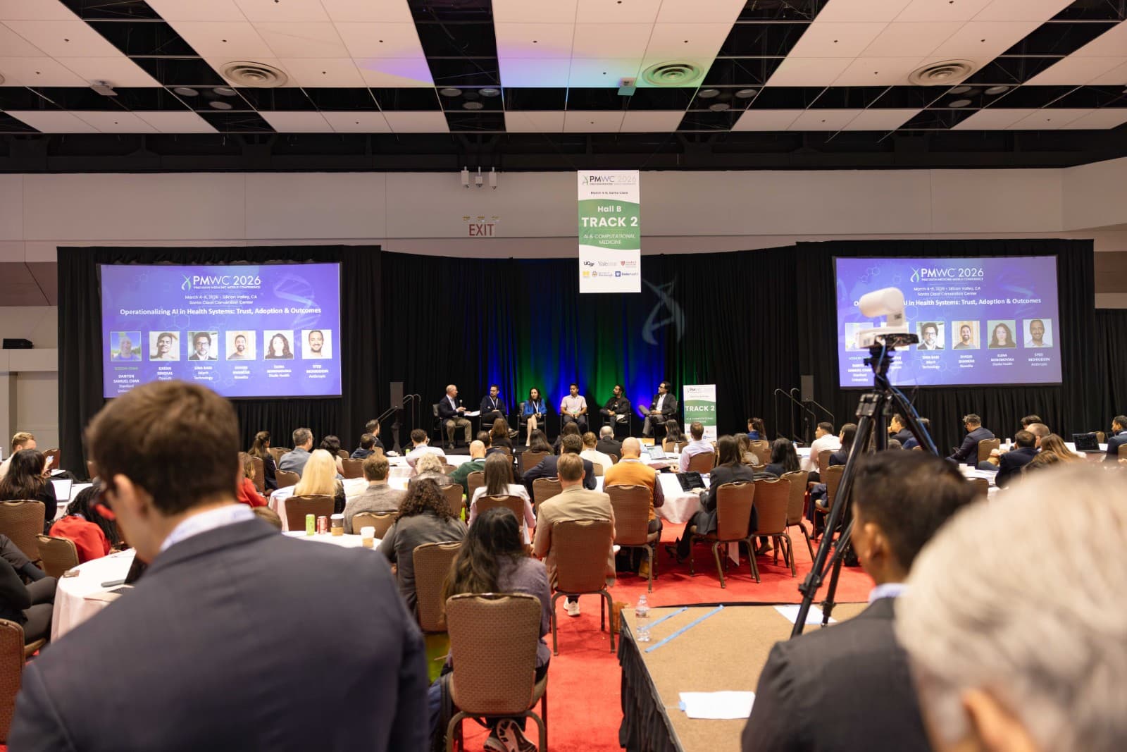 Healthcare professionals exchanging ideas at Novellia PMWC 2026 booth in Silicon Valley by JY Studio