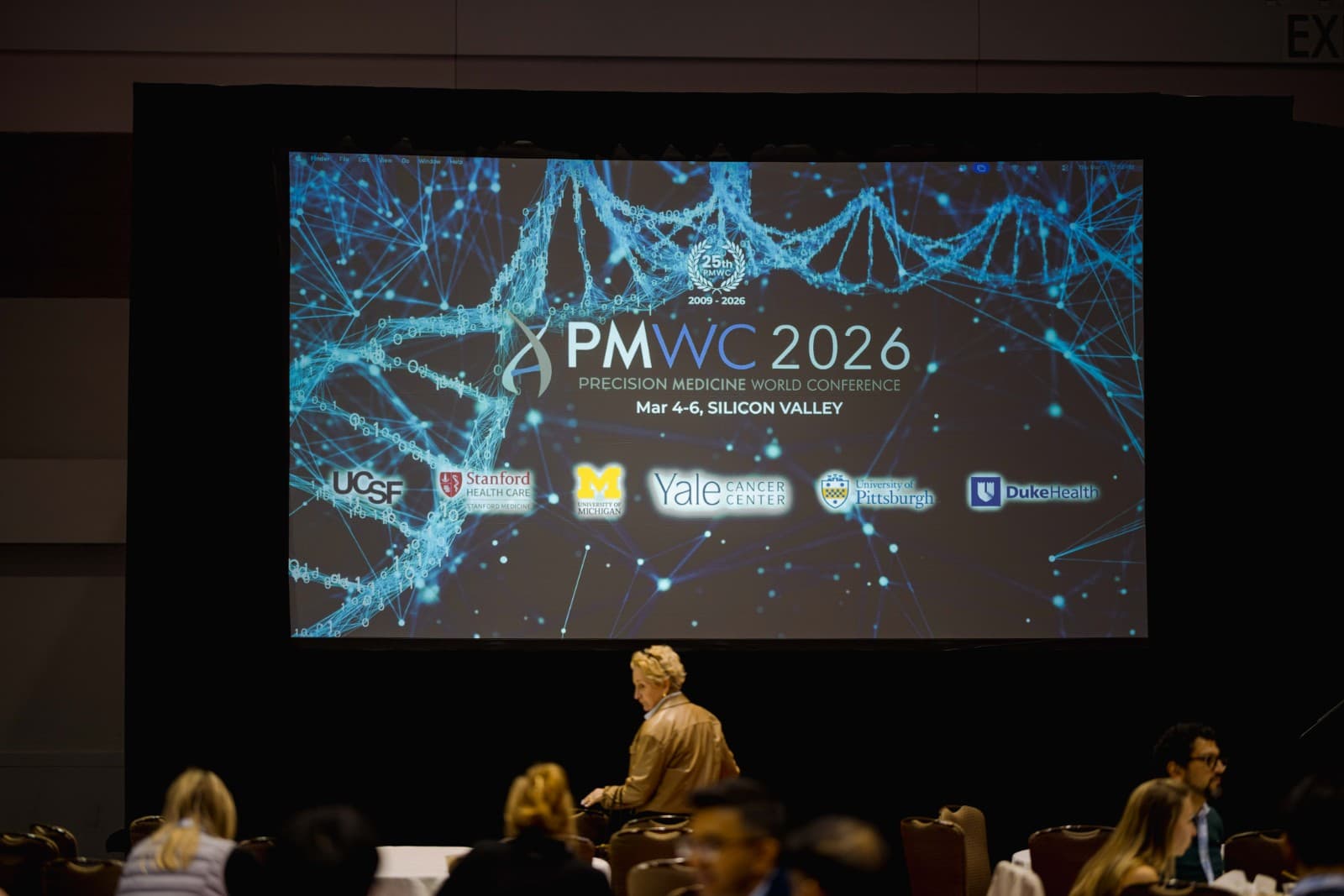 Closing moments and team celebration at Novellia booth PMWC 2026 Santa Clara conference by JY Studio