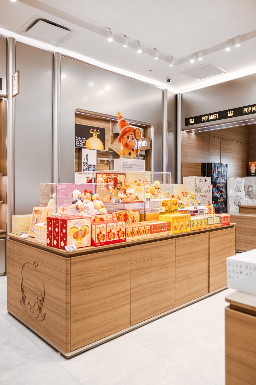 Shoppers exploring Pop Mart store interior at Hillsdale Mall grand opening San Mateo Bay Area by JY Studio