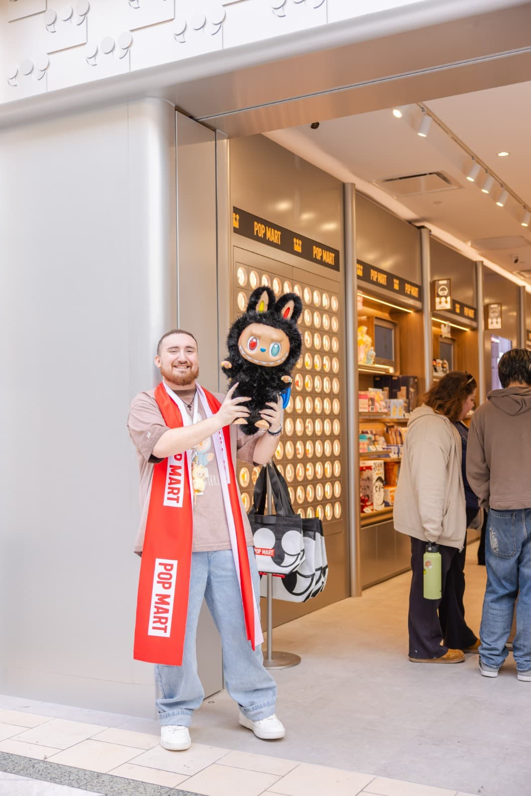 Pop Mart in-store experience and product shelves at Hillsdale Mall grand opening San Mateo by JY Studio