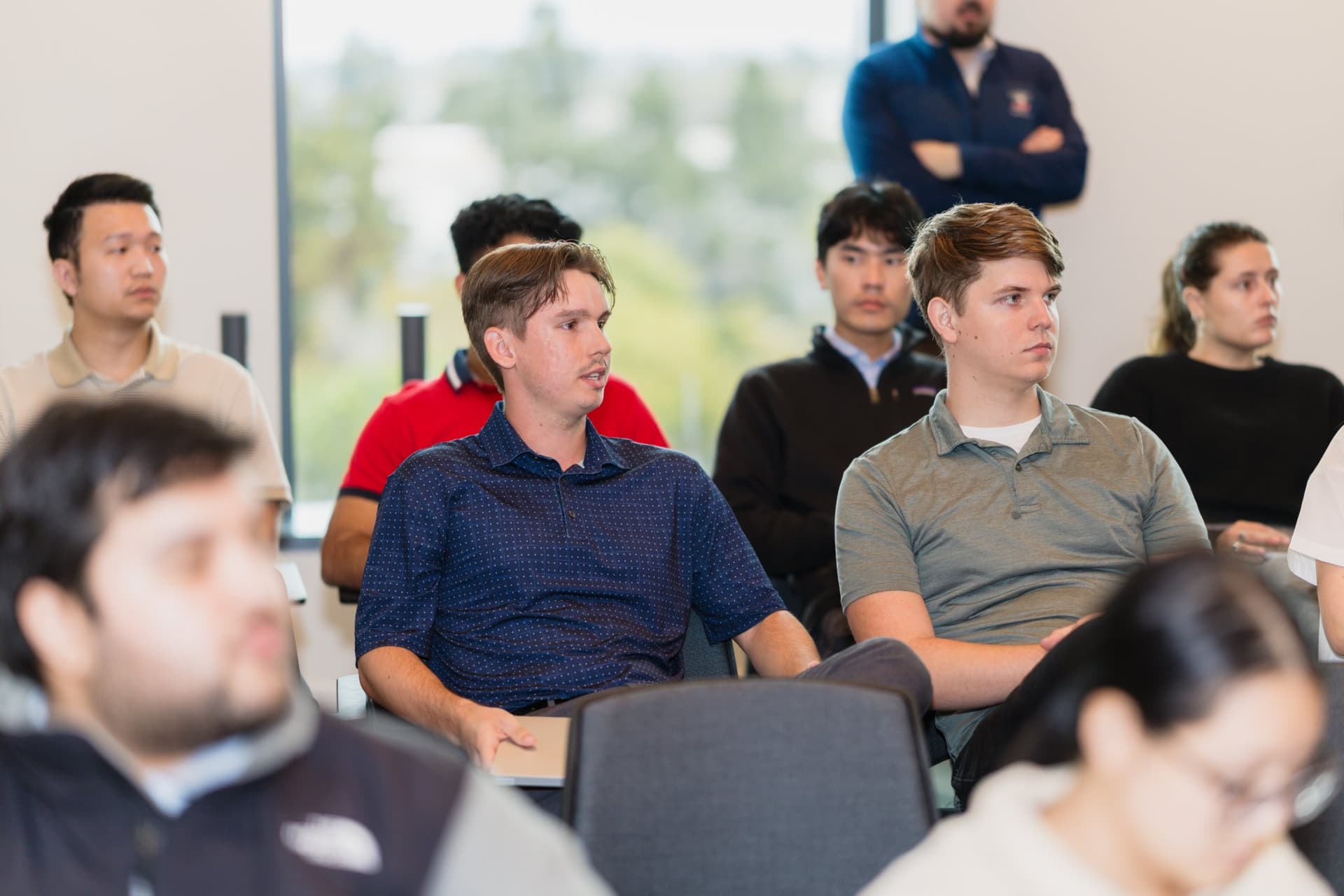Attendees listening closely during the fireside chat at the PwC x 49ers event at PwC Silicon Valley in San Jose by JY Studio