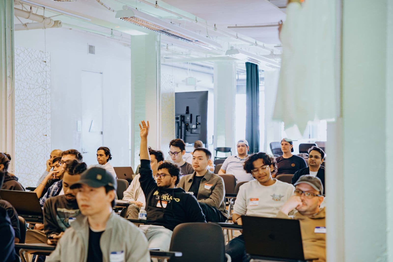 Tech industry gathering and social interaction at TRAE Hackathon in San Francisco by JY Studio