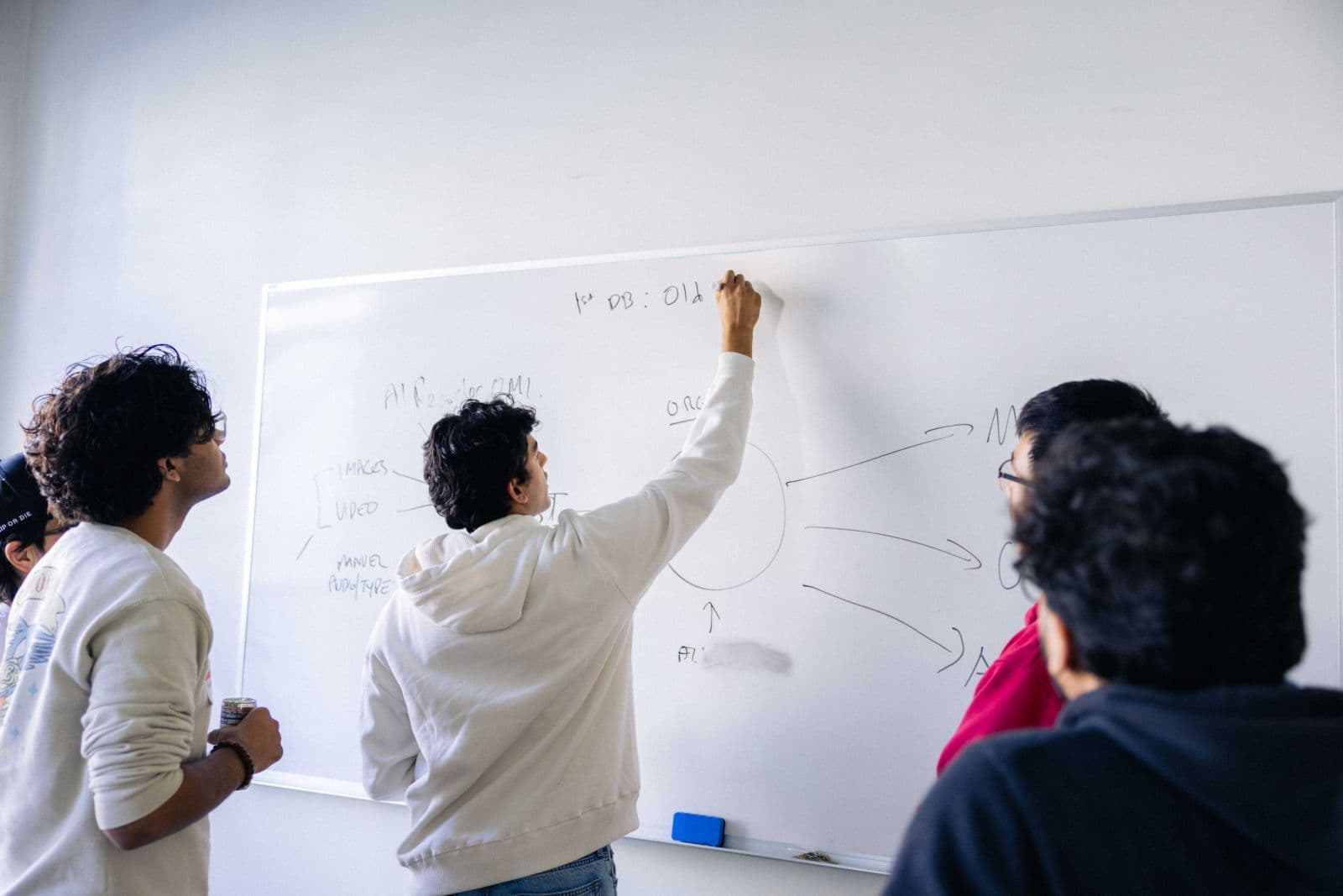 Engaged audience listening to presentations at TRAE Hackathon in San Francisco by JY Studio