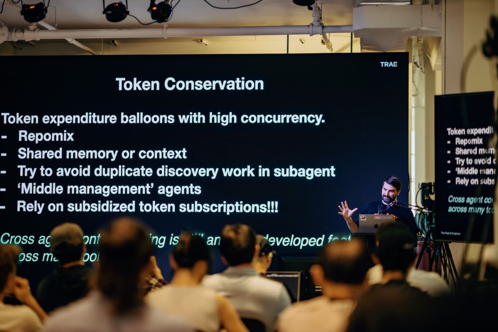 Attendees engaging in group discussion at TRAE Meetup networking event in Silicon Valley by JY Studio