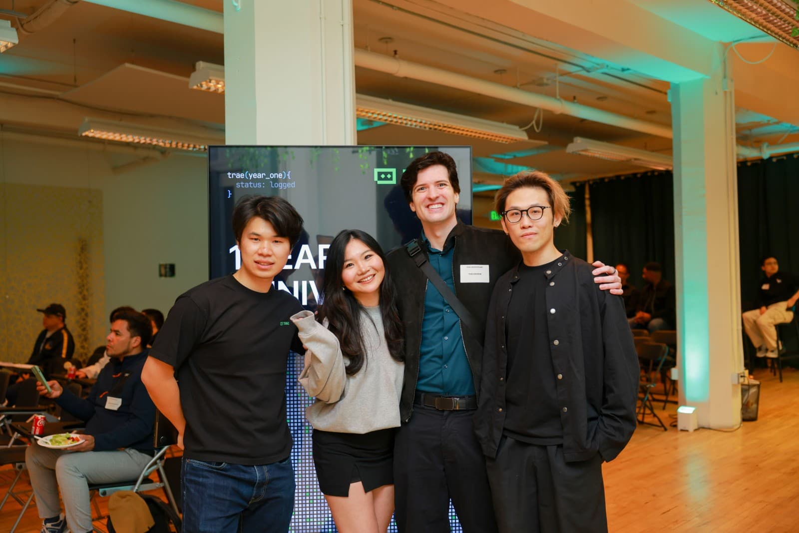 Event photography capturing team interactions at TRAE Meetup in Silicon Valley by JY Studio