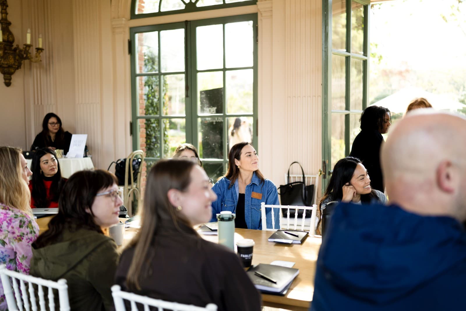 Zapier employees collaborating during team workshop at Filoli Garden in San Francisco Bay Area by JY Studio