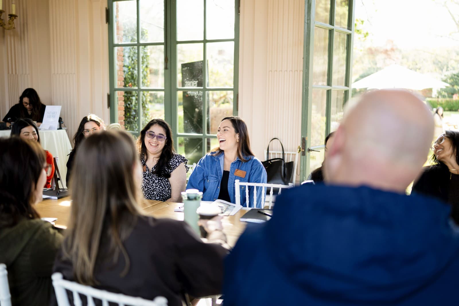 Speaker addressing Zapier team during Outpost event at Filoli Garden Woodside by JY Studio