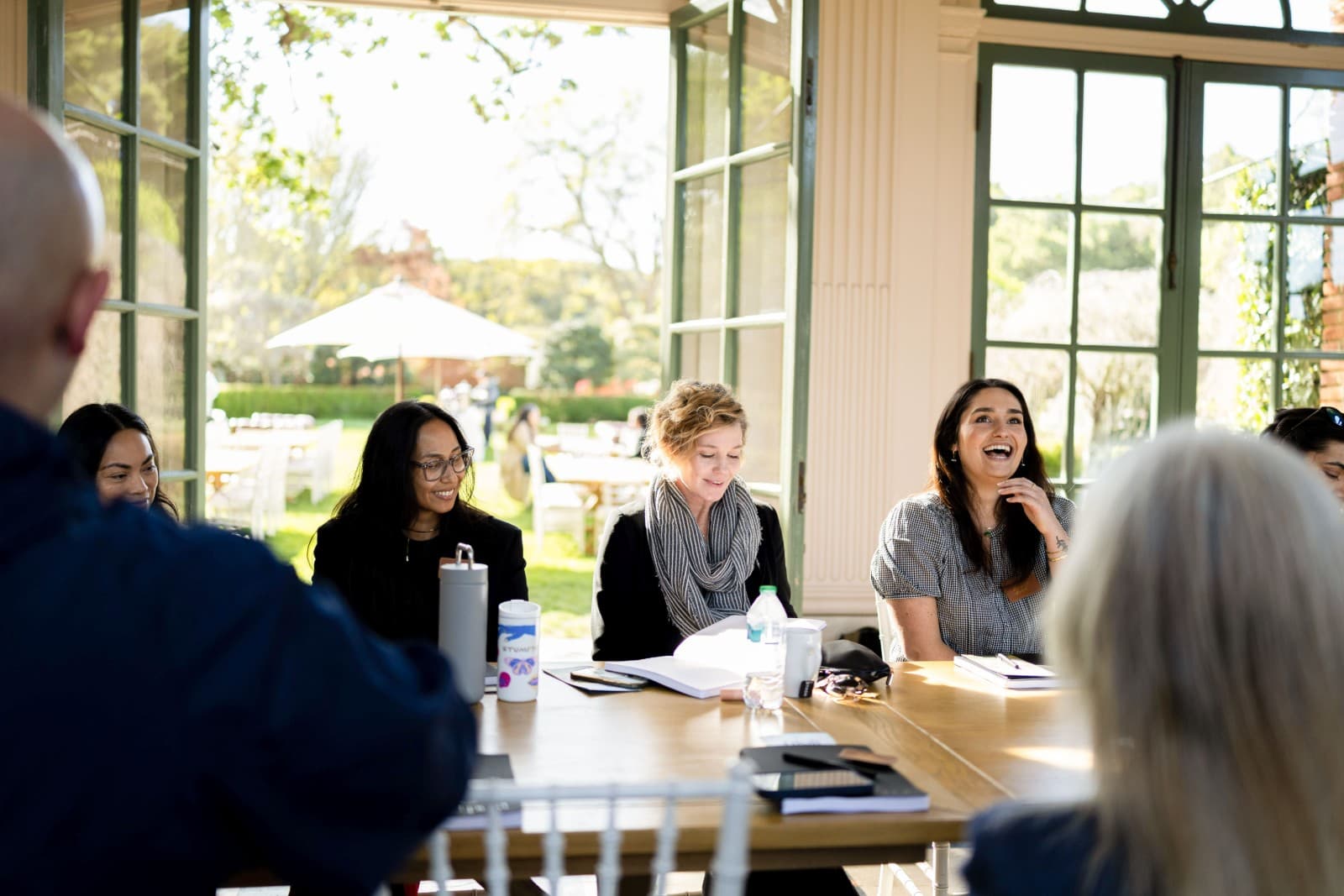 Zapier team members walking through Filoli formal gardens during corporate offsite by JY Studio