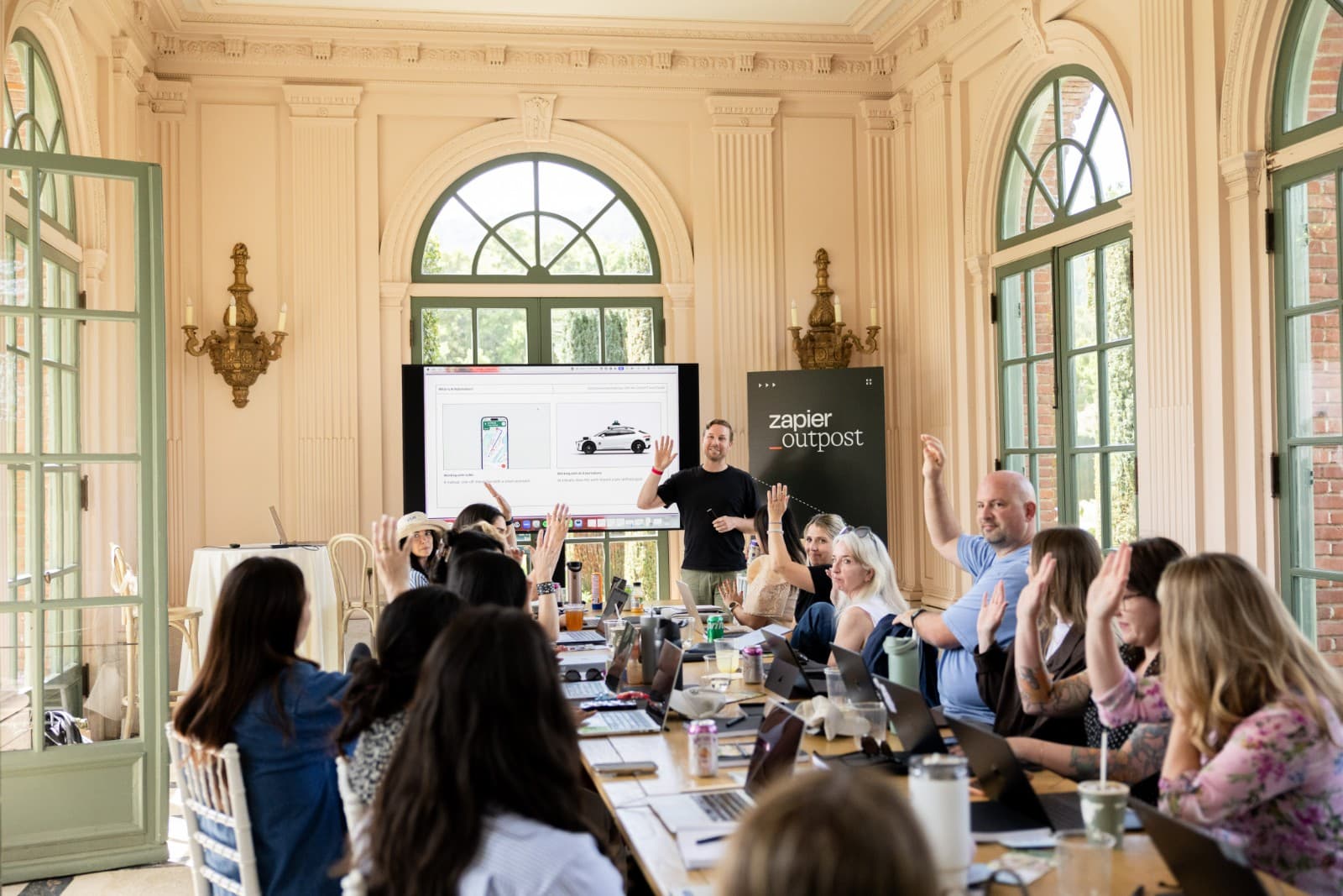 Zapier team walking through Filoli sunken garden during corporate offsite by JY Studio