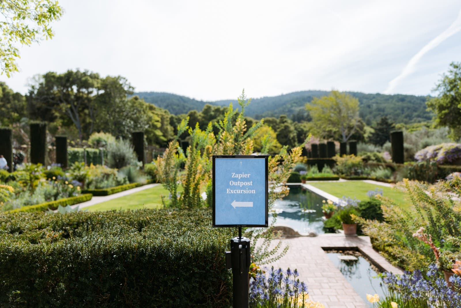 Zapier team applauding during keynote at Filoli Historic House in Woodside by JY Studio