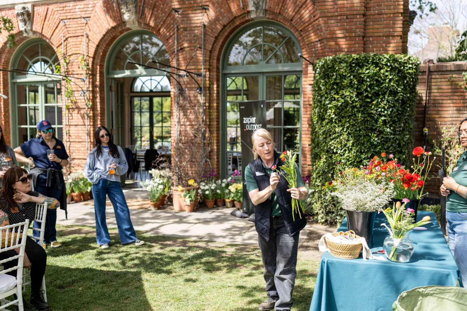 Zapier team members networking by Filoli reflecting pool in Woodside Bay Area by JY Studio