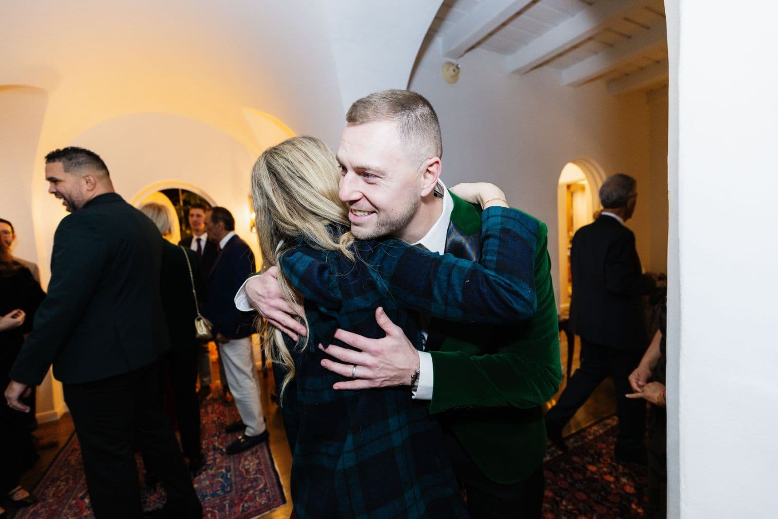 Guests enjoying holiday celebration moments at Family Christmas Party in Oakland by JY Studio