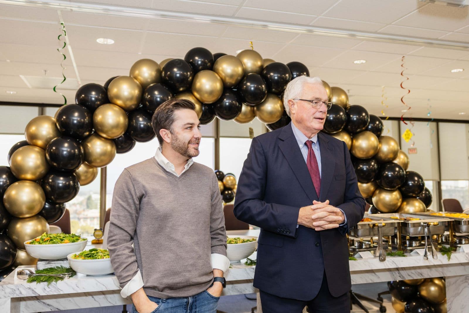 Group celebration at retirement party in San Mateo by JY Studio